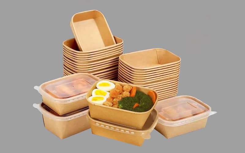 Máquina automática para fabricar loncheras de papel rizado cuadrado para envasar alimentos.